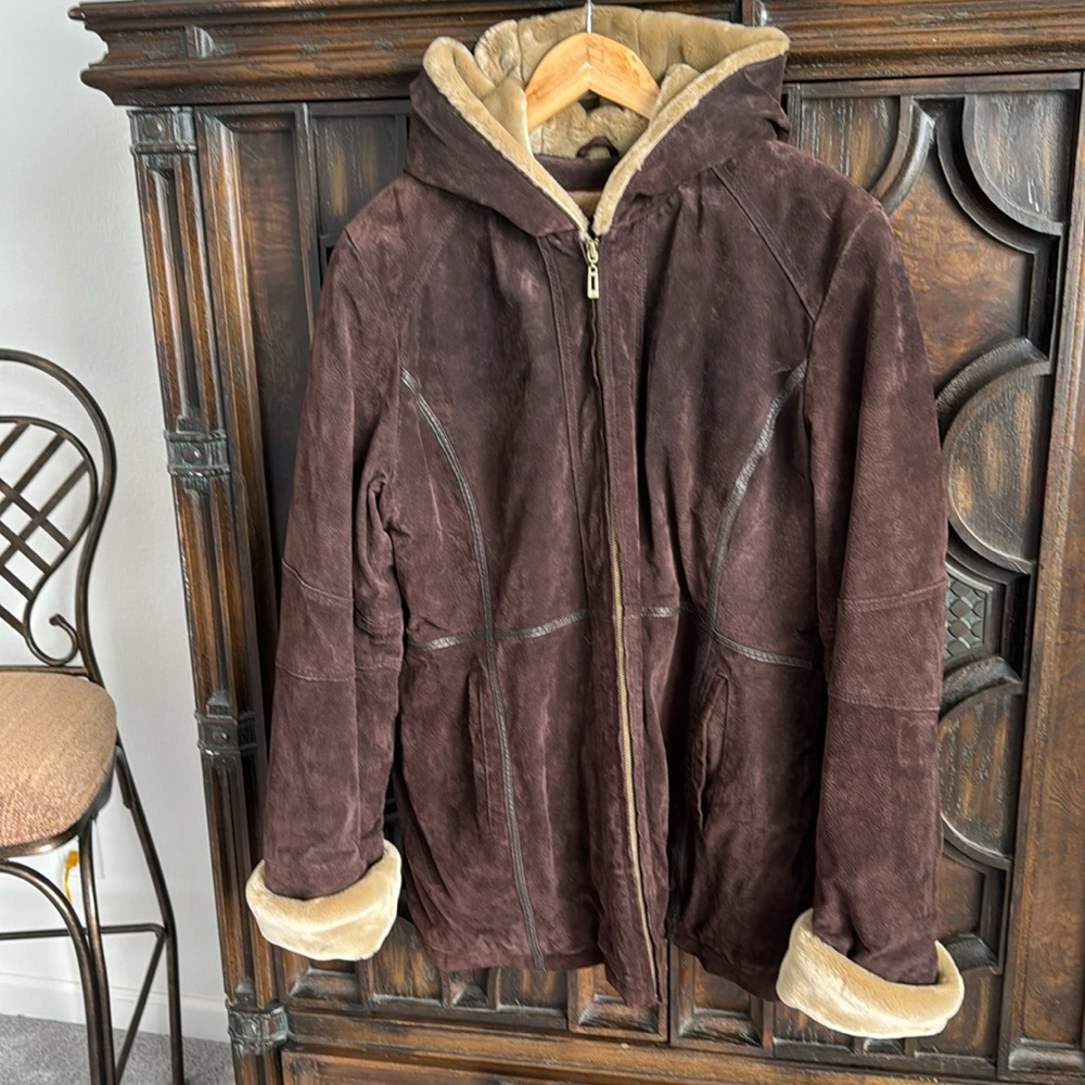 Wilson’s genuine leather and suede brown size XL in great condition.